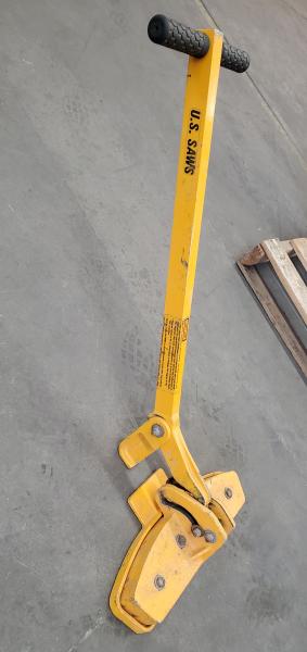 Used U.S. Saws Magnetic Manhole Cover Removal Tool.