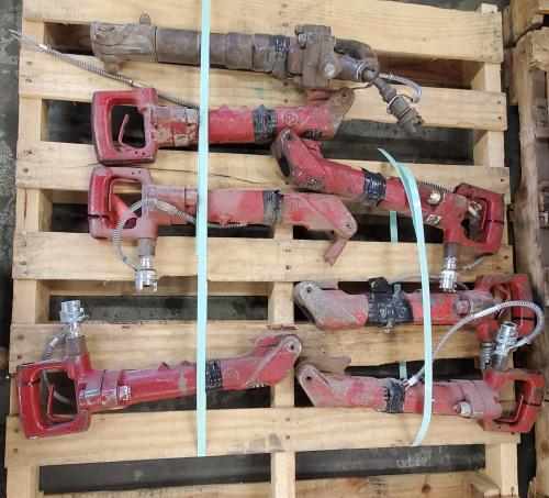 Lot of 7 Chicago Pneumatic Air Rock Drills / Jackhammers Used heavy-duty pneumatic rock drills, ideal for demolition, quarry, or construction use. Includes air fittings and hoses as pictured. Sold as-is, untested. - Image 1