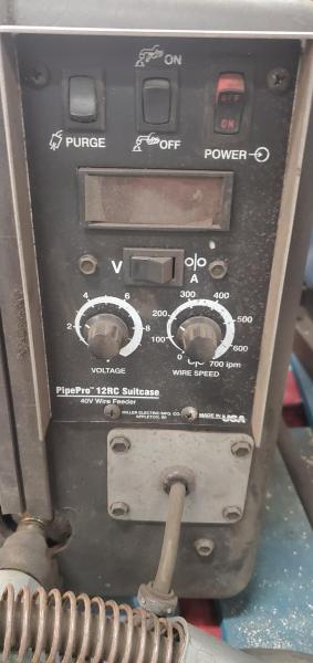 Miller PipePro 450 RFC industrial welding power source with PipePro suitcase wire feeder. Includes feeder cables, welding leads, and Miller transport case. - Image 3