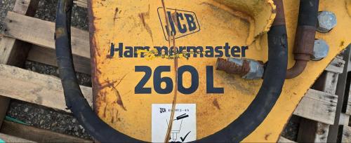 JCB Hammermaster 260L hydraulic breaker/hammer attachment with hoses, heavy-duty skid steer/excavator mount, used condition. - Image 2
