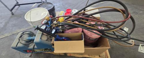 Mixed lot of HVAC/refrigeration equipment, drain augers, flooring materials, and assorted compounds/chemicals on pallet. - Image 1