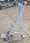 Heavy-duty steel cylinder cart designed to transport compressed gas cylinders. 