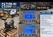 Commercial-grade TRUE Fitness CS200 upright exercise bike. 