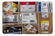 Lot of automotive replacement parts, components, and accessories from surplus inventory.
