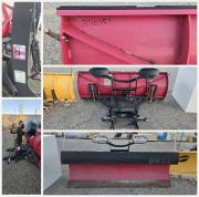 BOSS 7 ft 6 in Snowplow blade assembly with mounting frame and hydraulic/electrical components.