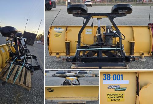 Fisher snowplow blade assembly with black mounting frame and hydraulic/electrical components. - Image 1